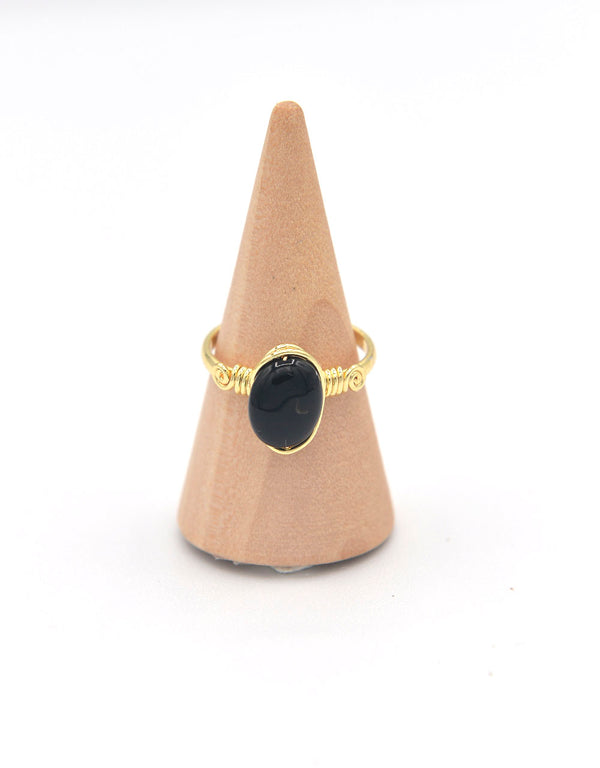 Ring in gilded bronze and semiprecious stones